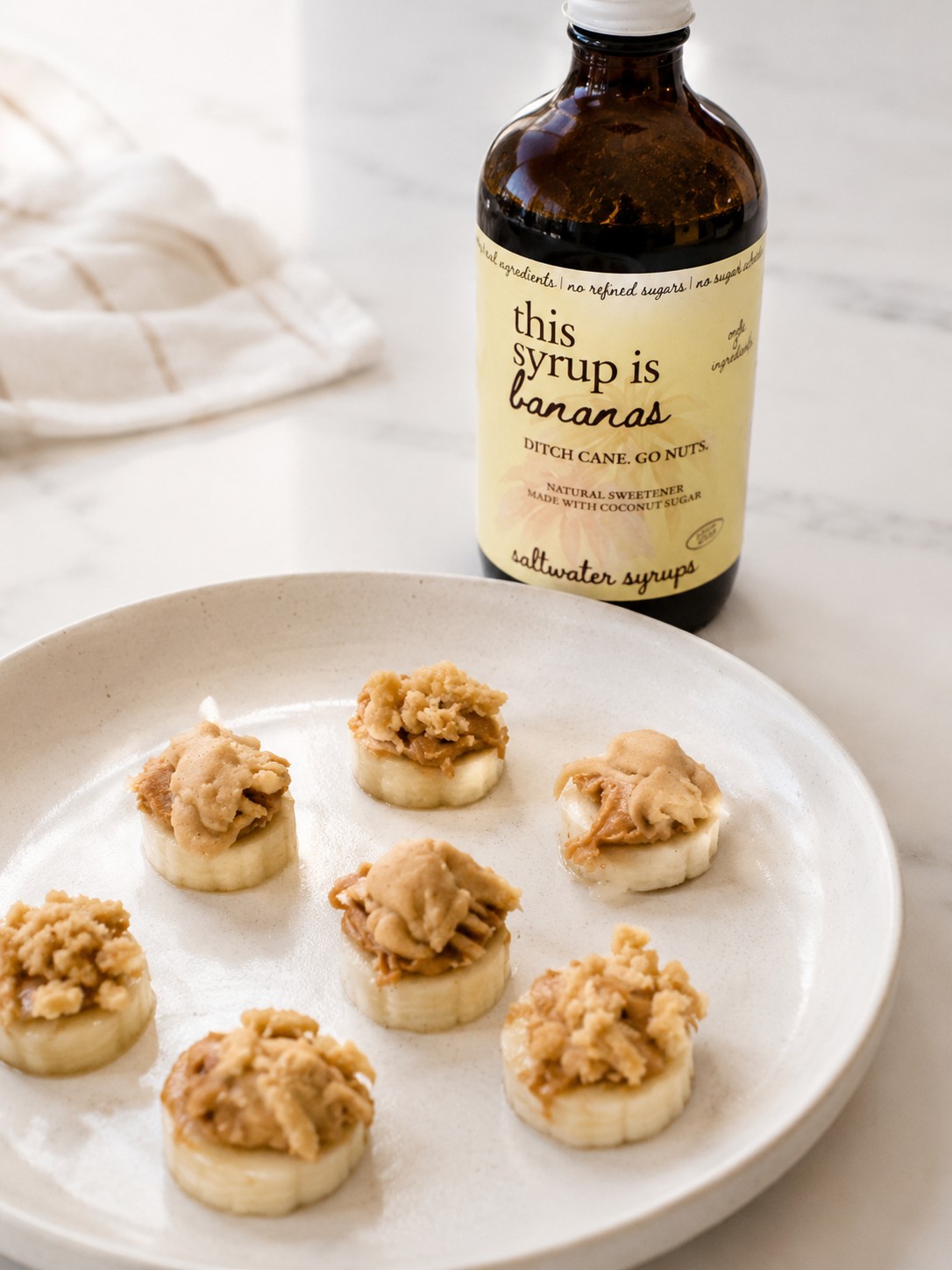 Banana Peanut Butter Bites drizzled with Saltwater Banana Syrup